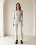 Black chelsea boots on model, front view | Maison Perigee — front