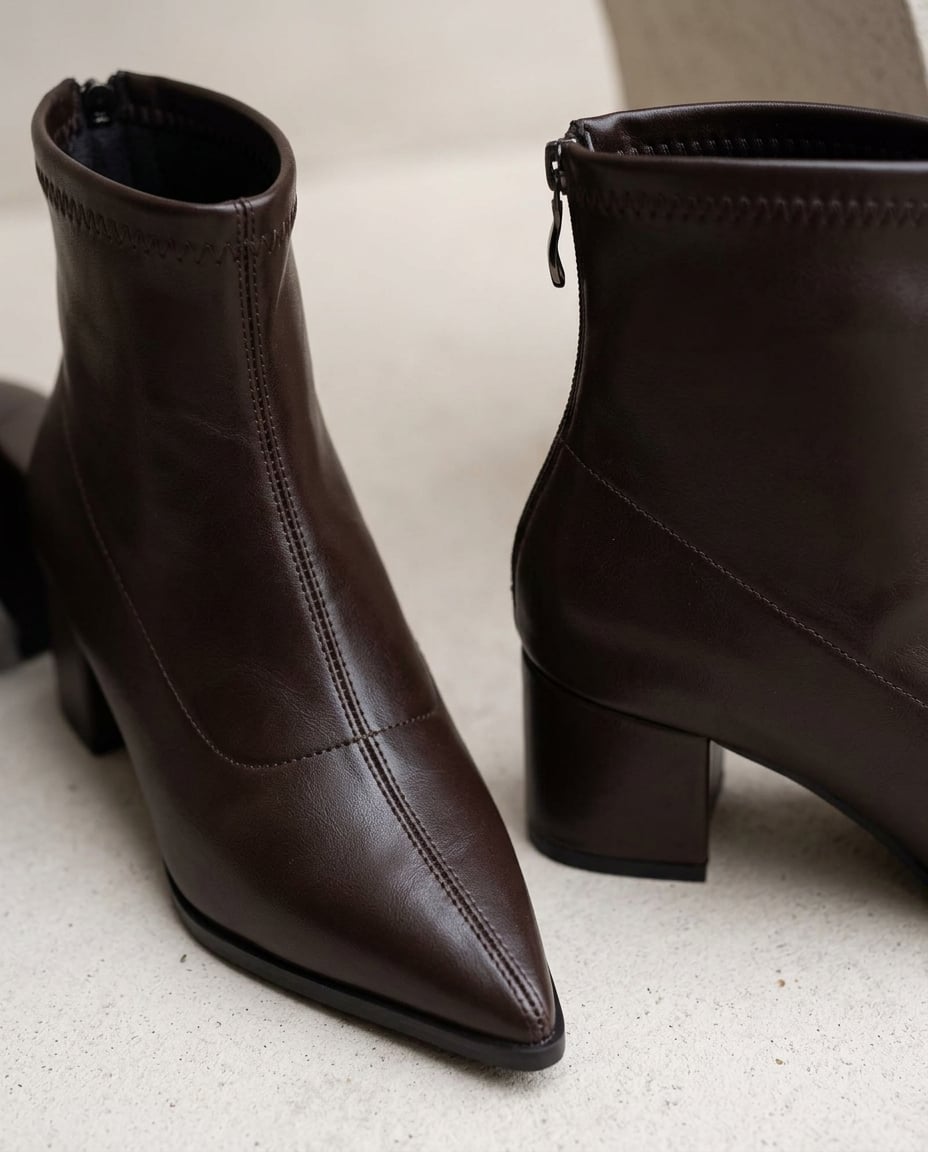 Chocolate ankle boots material and heel detail | Maison Perigee — detail