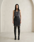Black over-the-knee boots on model, front view | Maison Perigee — front