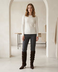 Chocolate knee-high boots on model, front view | Maison Perigee — front