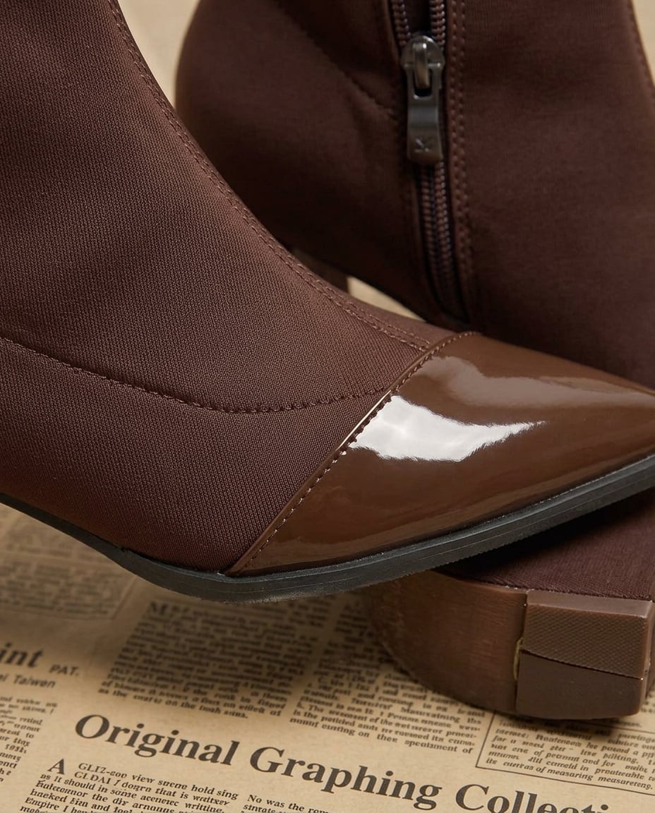 Brown ankle boots material and heel detail | Maison Perigee — detail